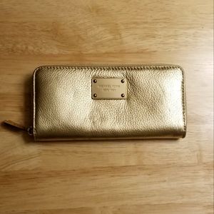 Michael Kors gold leather clutch